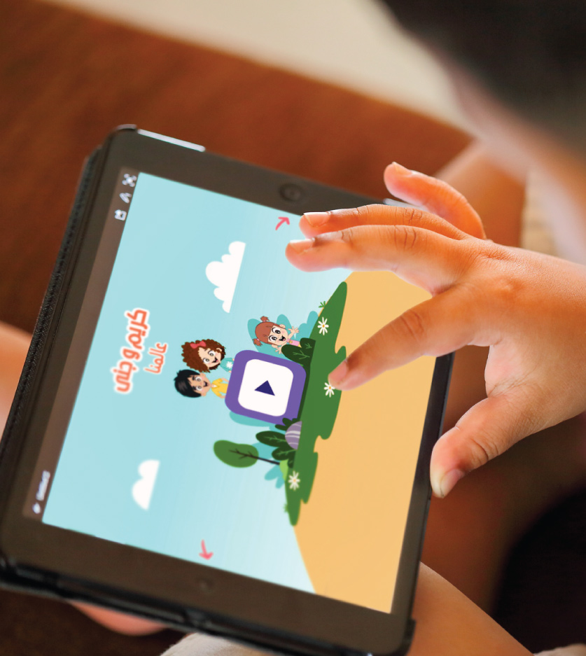 child playing on tablet 