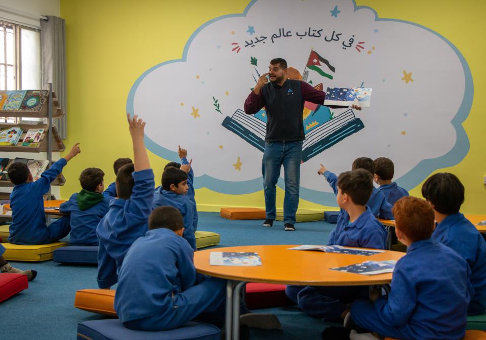 children reading in school library